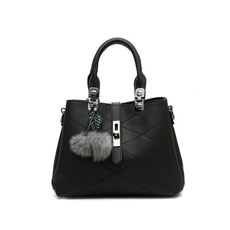 Elegant Black Leather Handbag with Pom Charm